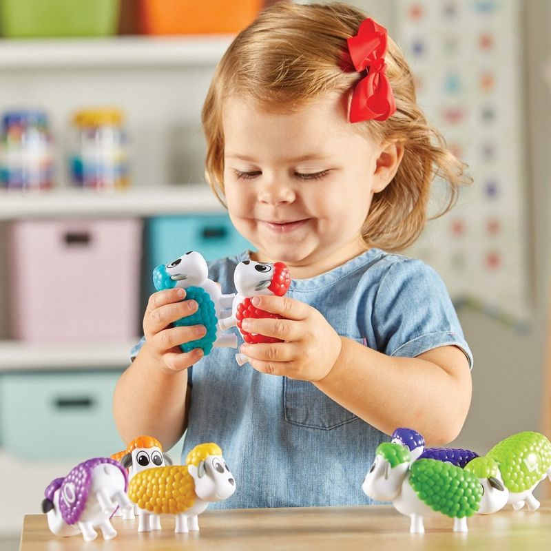 картинка Развивающая игрушка "Разноцветные овечки" (серия Snap-N-Learn, 20 элементов) от магазина снабжение школ